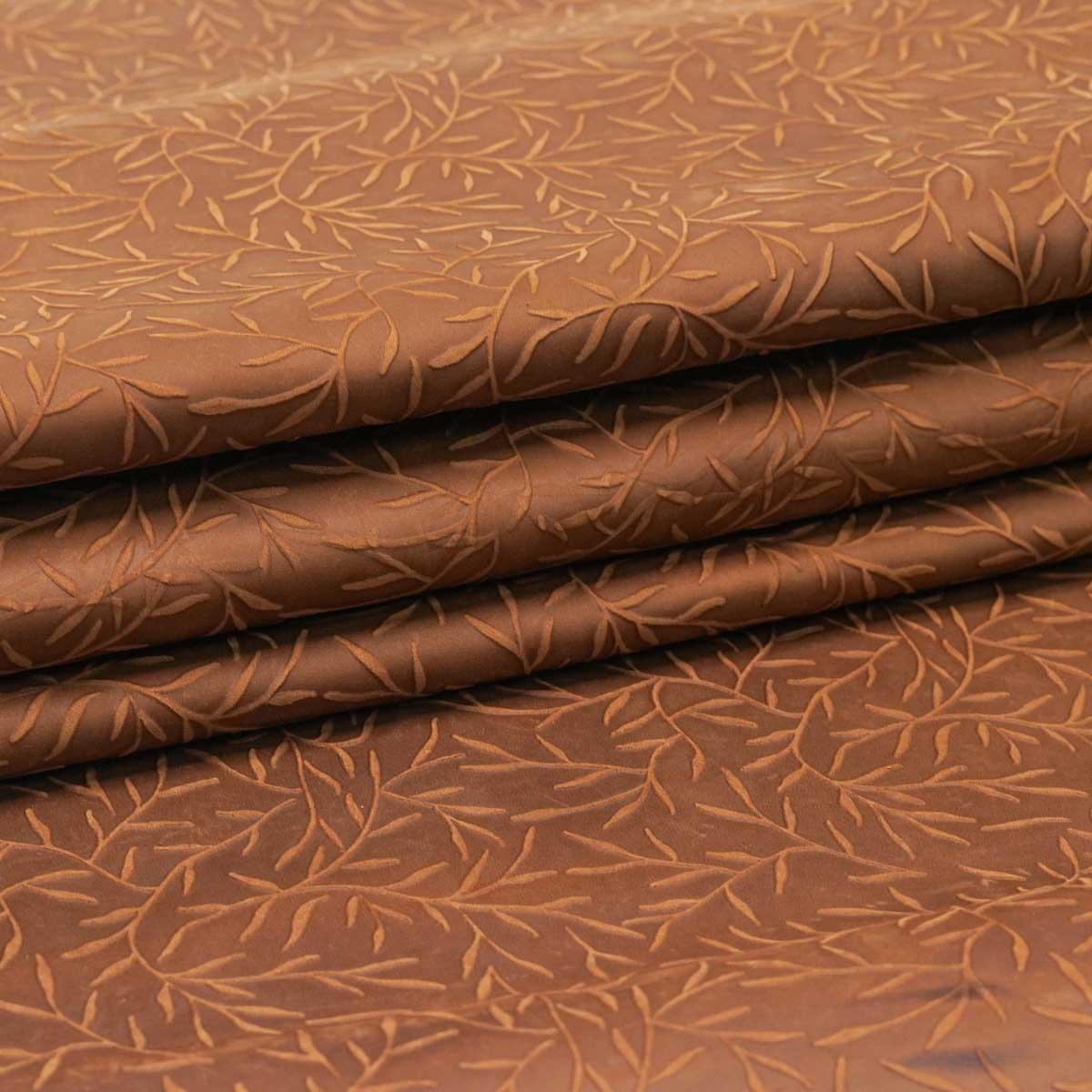 VEC.Sepia.02.jpg Vines Embossed Cow Image