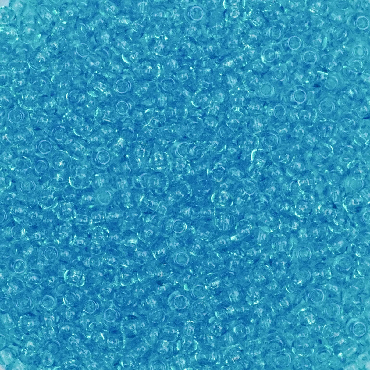 26-110243.SLC.1.jpg 11/0 Seed Beads - Transparent Turquoise Blue 20g Image