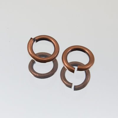 339-127.SLC.jpg 6mm Jump Rings - Antique Copper 20pk Image