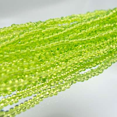 26-110203.SLC.jpg 11/0 Seed Beads - Transparent Light Green Image