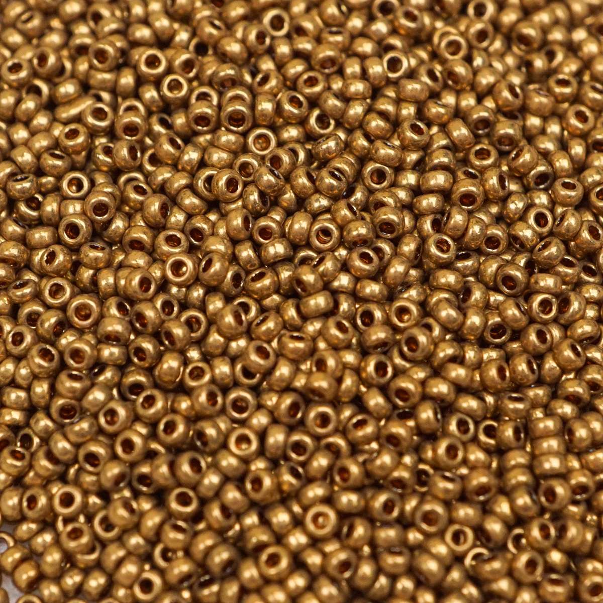 45-159457.SLC.1.jpg 15/0 Seed Beads - Metallic Light Bronze 8.2g Image
