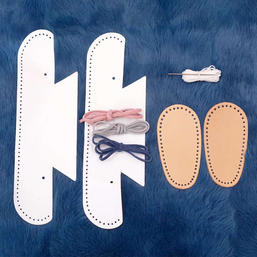 144-5782.SLC2.jpg White Leather Baby Moccasin Kit Image