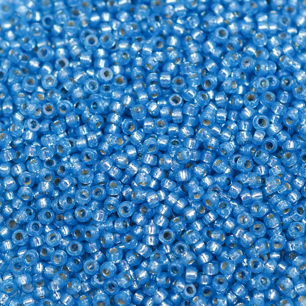 45-1594242.SLC.1.jpg 15/0 Seed Beads - Duracoat Silver Lined Dyed Aqua 8.2g Image