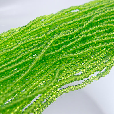 26-110205.SLC.jpg 11/0 Seed Beads - Transparent Green Image