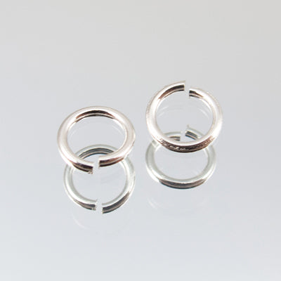 144-1008.SLC.jpg 25pk 6mm Silver Jump Rings Image
