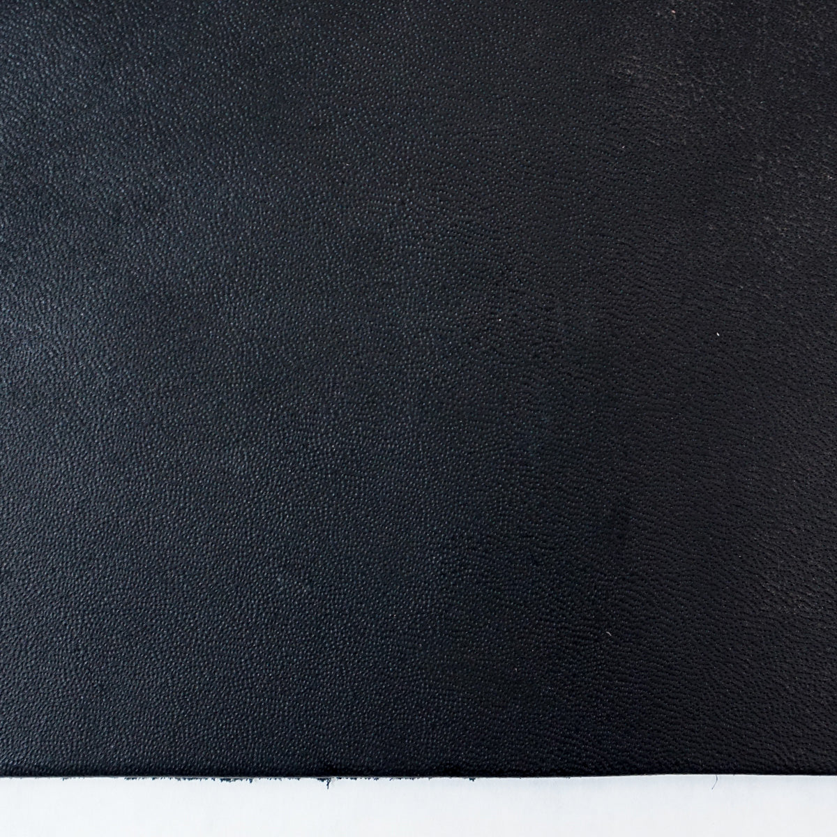 49-9024.SLC.4.jpg Hermann Oak Drum Dyed Black Pre-Cut 6-7 oz. 24" x 24" Image