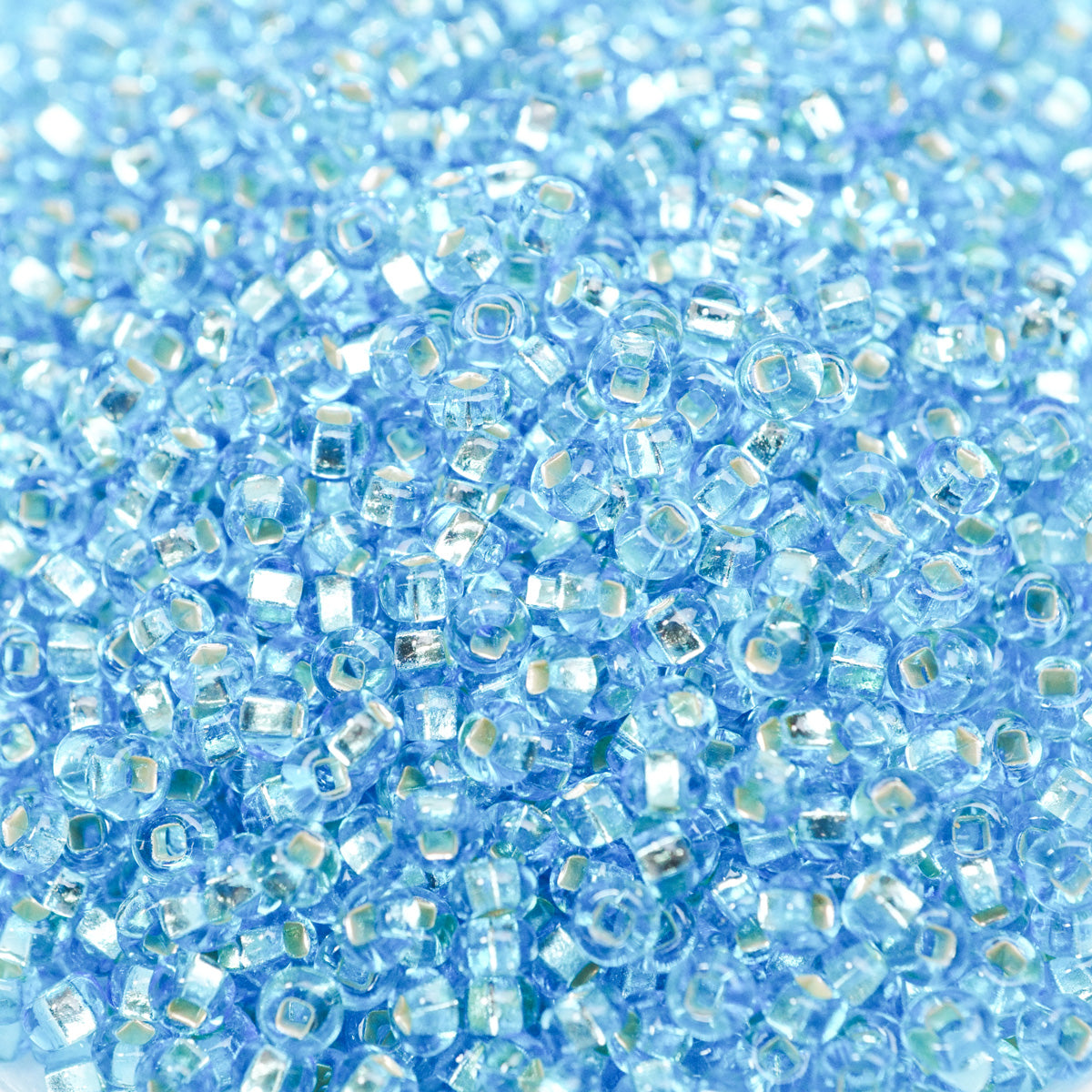 222-1442018.SLC.1.jpg 10/0 Seed Beads - Aqua Lined 110g Image