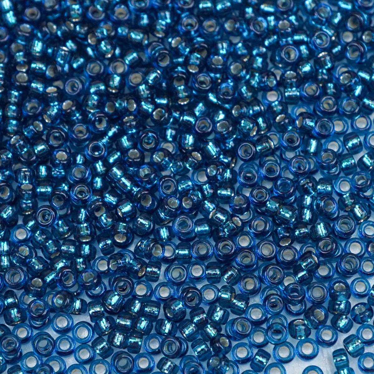 45-1591425.SLC.1.jpg 15/0 Seed Beads - Silver Lined Blue Zircon 8.2g Image