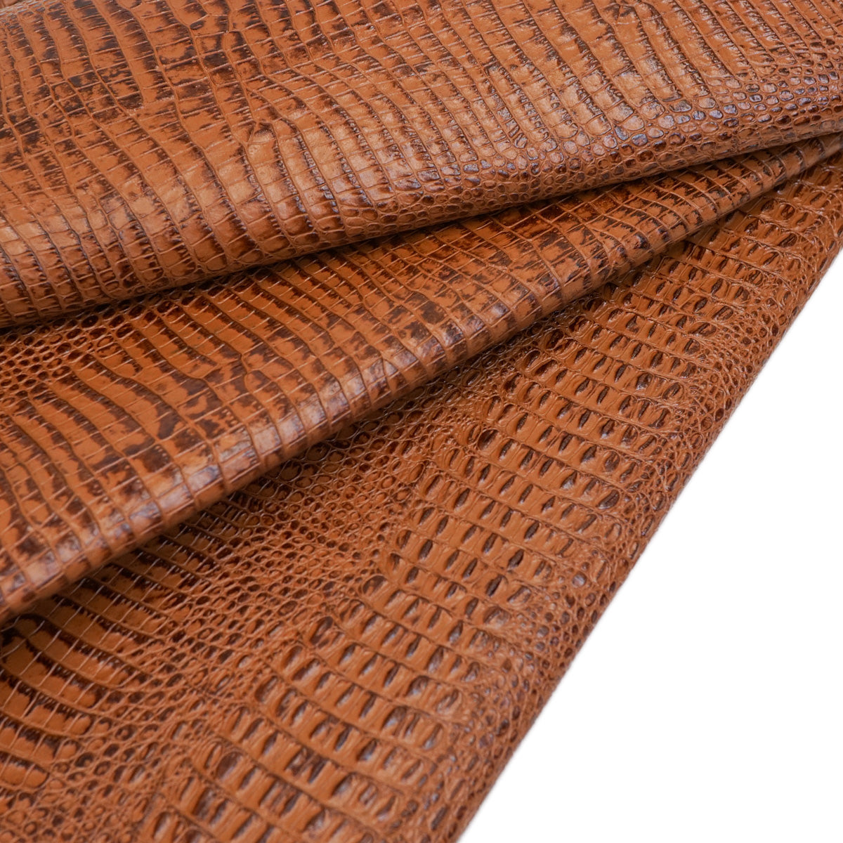 371-17903.SLC.2.jpg Embossed Gator on Cow - Cognac Image