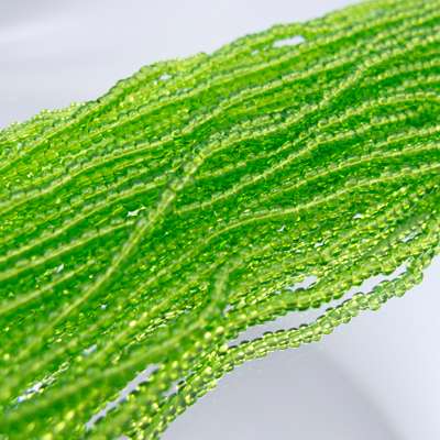 26-110205.SLC.jpg 11/0 Seed Beads - Transparent Green Image