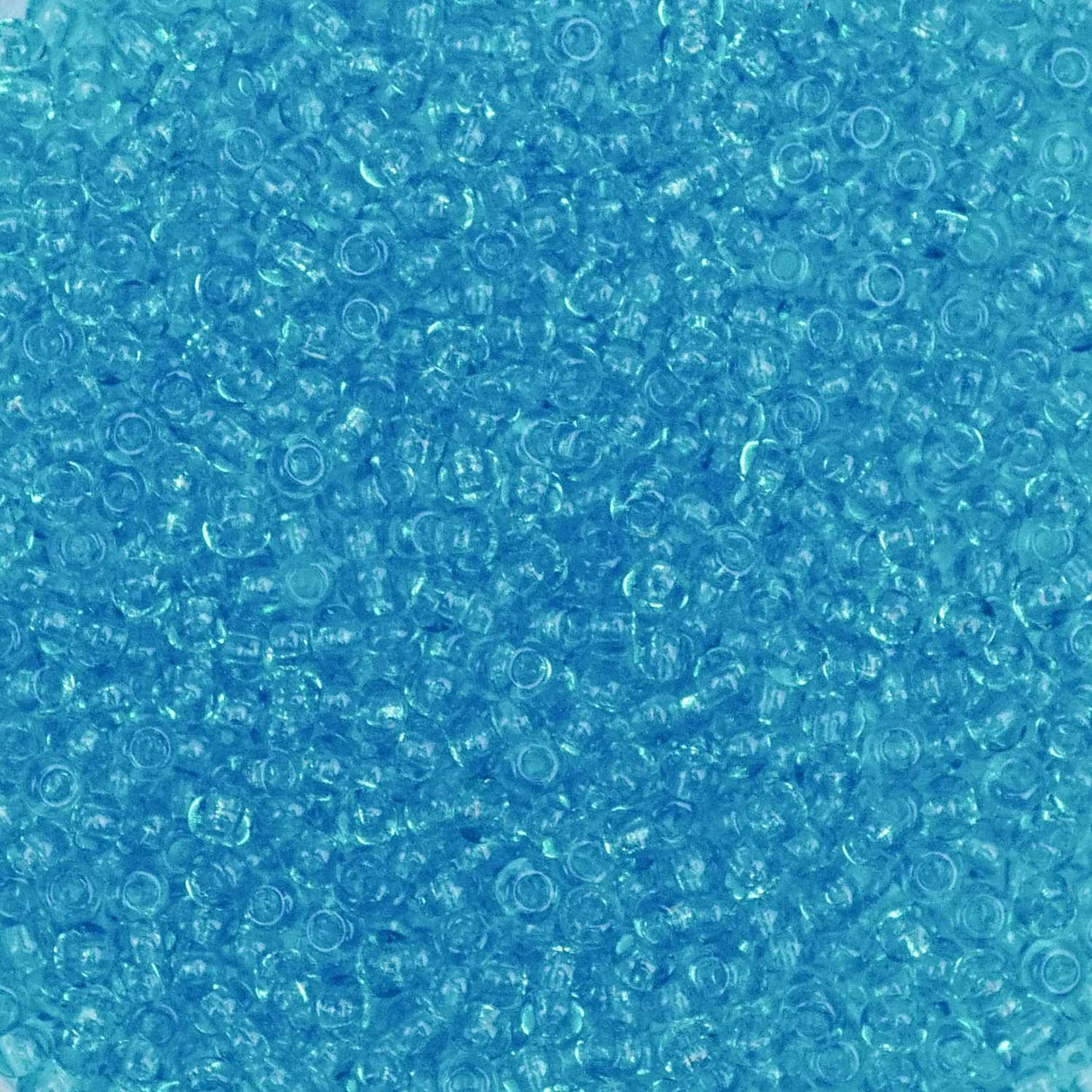 26-110243.SLC.1.jpg 11/0 Seed Beads - Transparent Turquoise Blue 20g Image