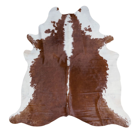 Hereford cowhide rug with a natural spotted pattern, isolated on a white background.
