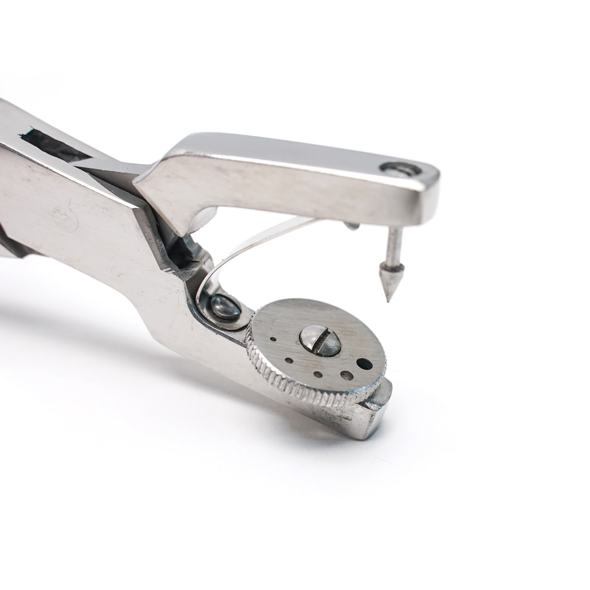Rotary Hand Sewing Punch tool from the side. Shows a stainless steel tool for punching stitching holes close up and graduated holes on a dial that spins.