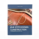 The Stitchdown Construction: A Comprehensive Step-by-Step Guide book by Marcell Mrsan, featuring a cover with a close-up photo of a brown leather shoe and a navy blue background.