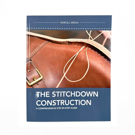 The Stitchdown Construction: A Comprehensive Step-by-Step Guide book by Marcell Mrsan, featuring a cover with a close-up photo of a brown leather shoe and a navy blue background.