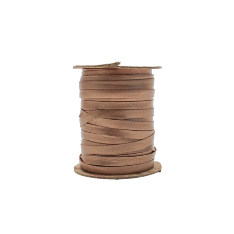 A spool of medium brown leather lace, wound tightly on a cardboard core, isolated on a white background.