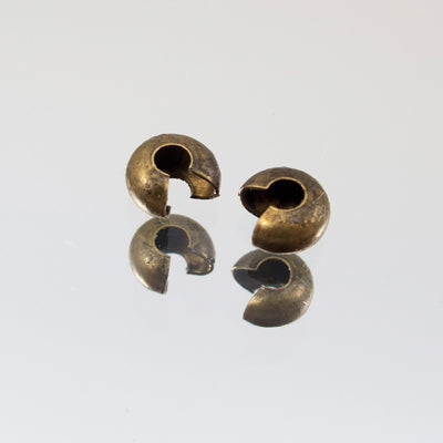 229-156.SLC.jpg 4mm Antique Brass Crimp Cover -12pk Image