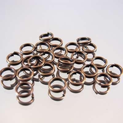 339-137.SLC.jpg 6mm Split Rings - Antique Copper 20pk Image
