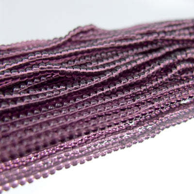 26-110284.SLC.jpg 11/0 Seed Beads - Transparent Dark Purple Image
