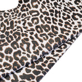 828-020.SLC.01.jpg Snow Leopard on Lamb Image