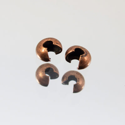 229-150.SLC.jpg 3mm Antique Copper Crimp Cover -144pk Image
