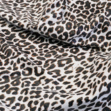 828-020.SLC.03.jpg Snow Leopard on Lamb Image