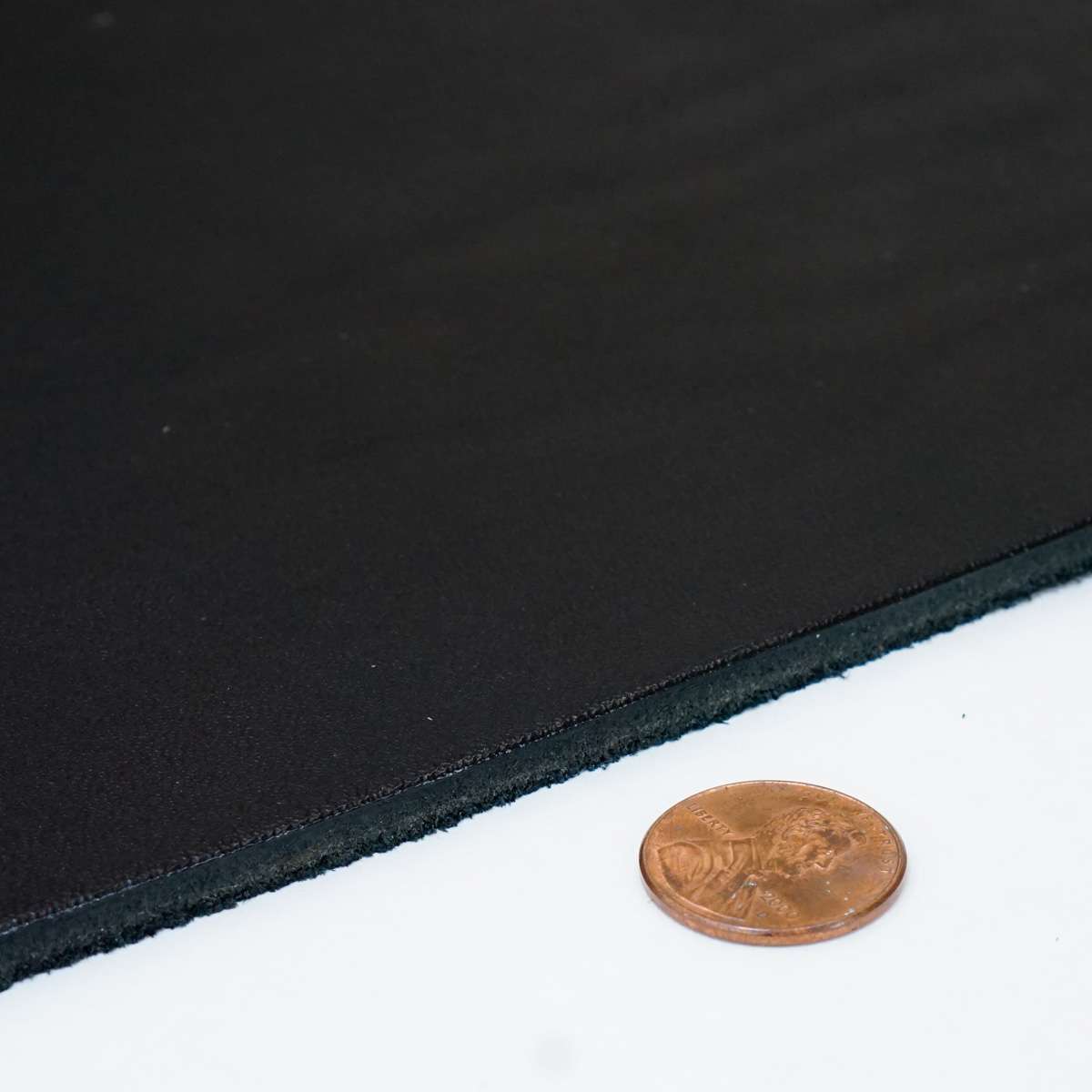 49-9124.SLC.3.jpg Hermann Oak Drum Dyed Black Pre-Cut 8-10 oz. 24" x 24" Image