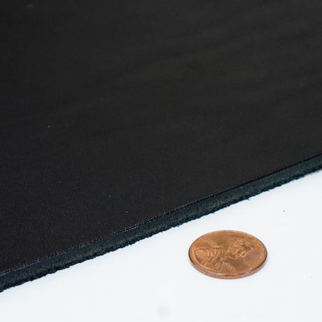 49-9122.SLC.3.jpg Hermann Oak Drum Dyed Black Pre-Cut 8-10 oz. 12" x 24" Image