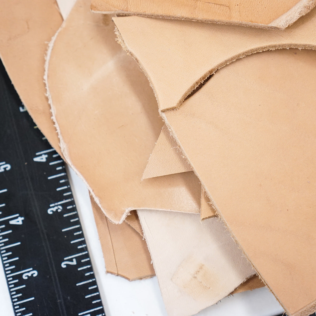 144-70770.SLC.2.jpg Veg Tan Tooling Leather Pieces - 2lbs Image