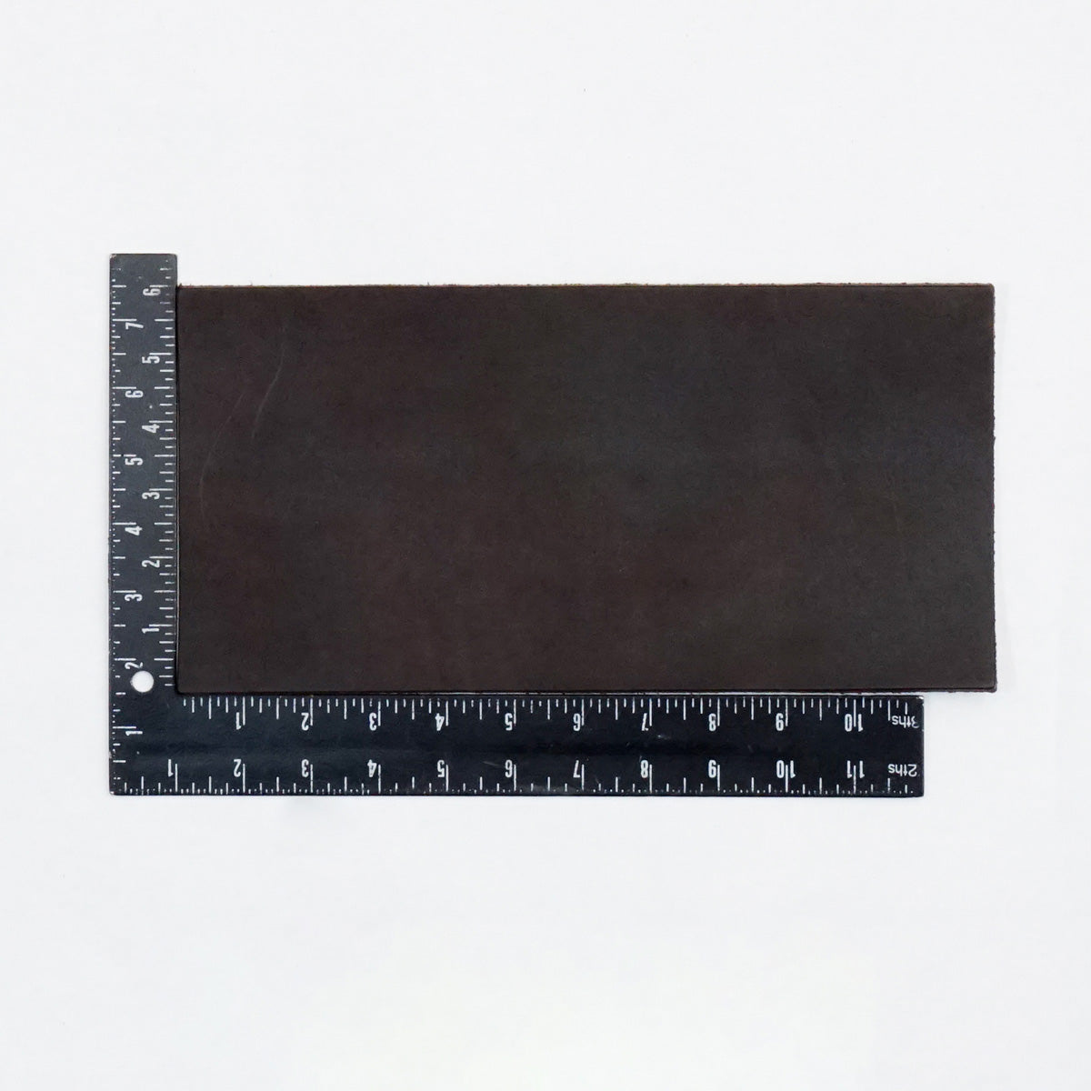 49-9110.SLC.2.jpg Hermann Oak Drum Dyed Brown Pre-Cut 6-7 oz. 6" x 12" Image