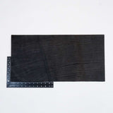 49-9122.SLC.2.jpg Hermann Oak Drum Dyed Black Pre-Cut 8-10 oz. 12" x 24" Image