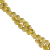 10mm Fossil Round Strand - Yellow