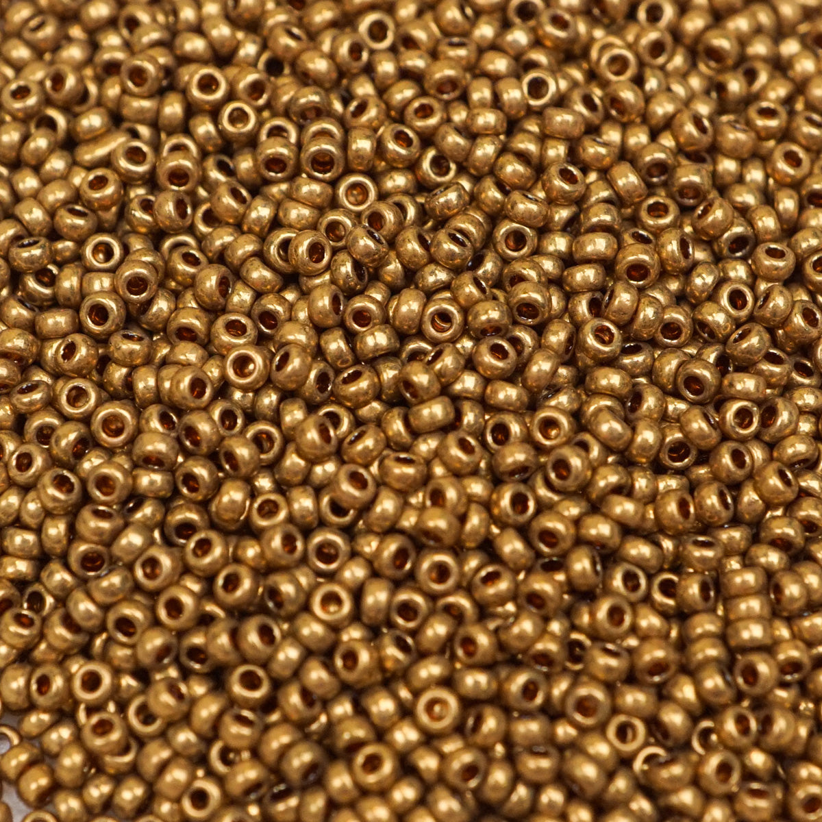 45-159457.SLC.1.jpg 15/0 Seed Beads - Metallic Light Bronze 8.2g Image