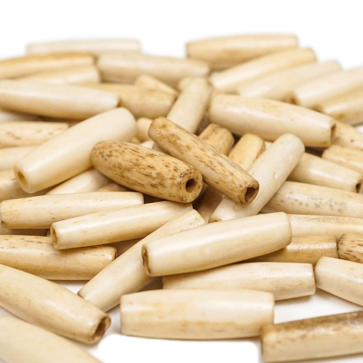 205-107.SLC.2.jpg 1" Hair Pipe Beads - Antique White 50pk Image