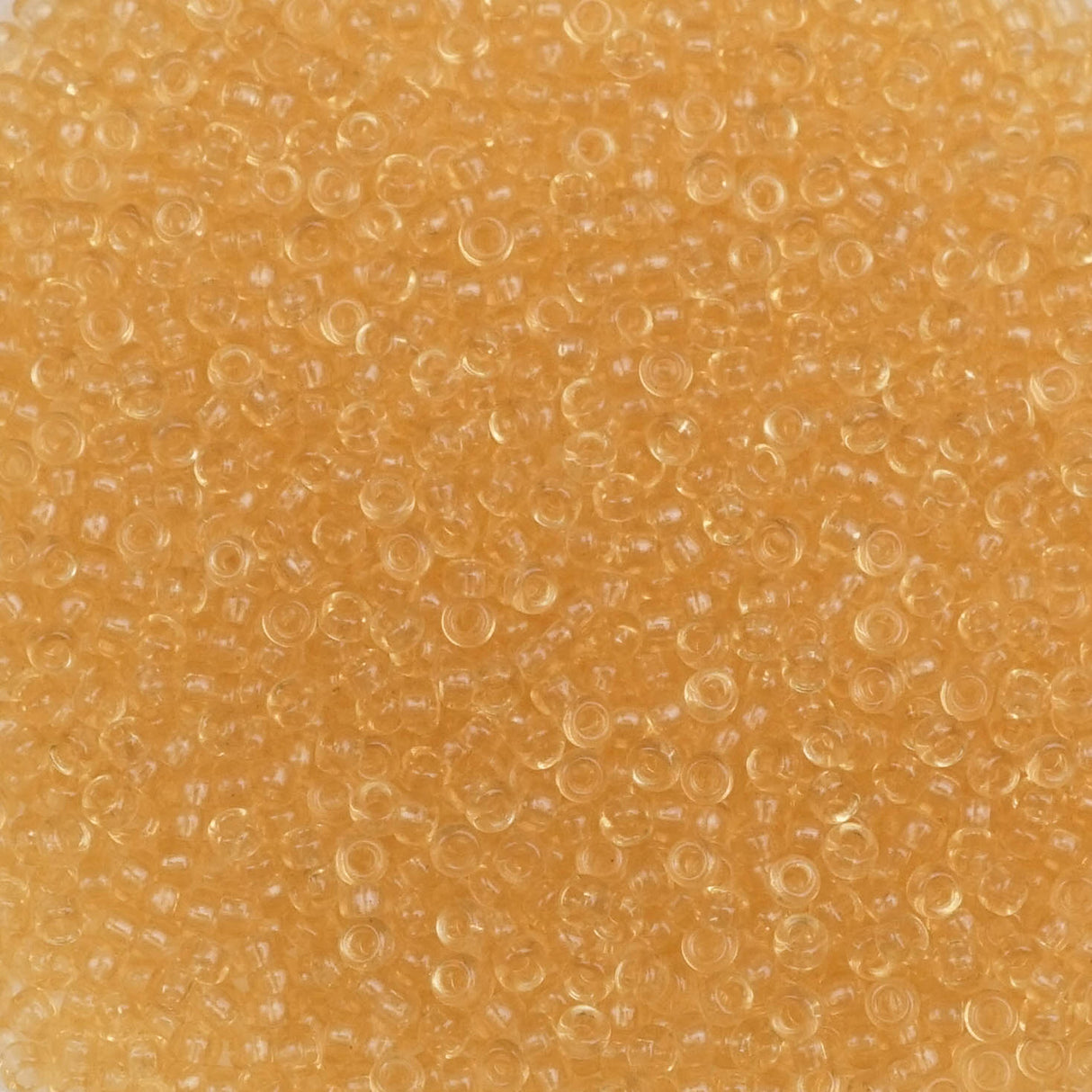 193-15132.SLC.1.jpg 15/0 Seed Beads - Transparent Light Topaz 10g Image