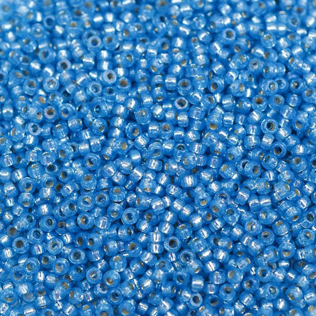 45-1594242.SLC.1.jpg 15/0 Seed Beads - Duracoat Silver Lined Dyed Aqua 8.2g Image