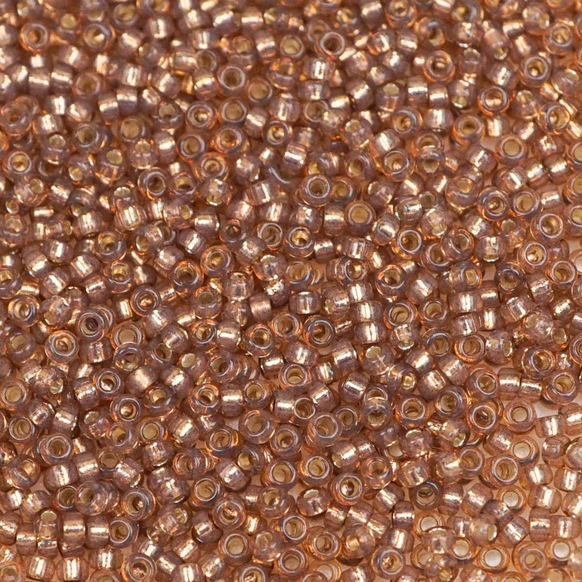 193-15641.SLC.1.jpg 15/0 Seed Beads - Rose Bronze S/L Alabaster 10g Image