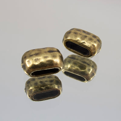 244-579227.SLC.jpg Antique Gold Plate Hammered Spacer - 2pk Image