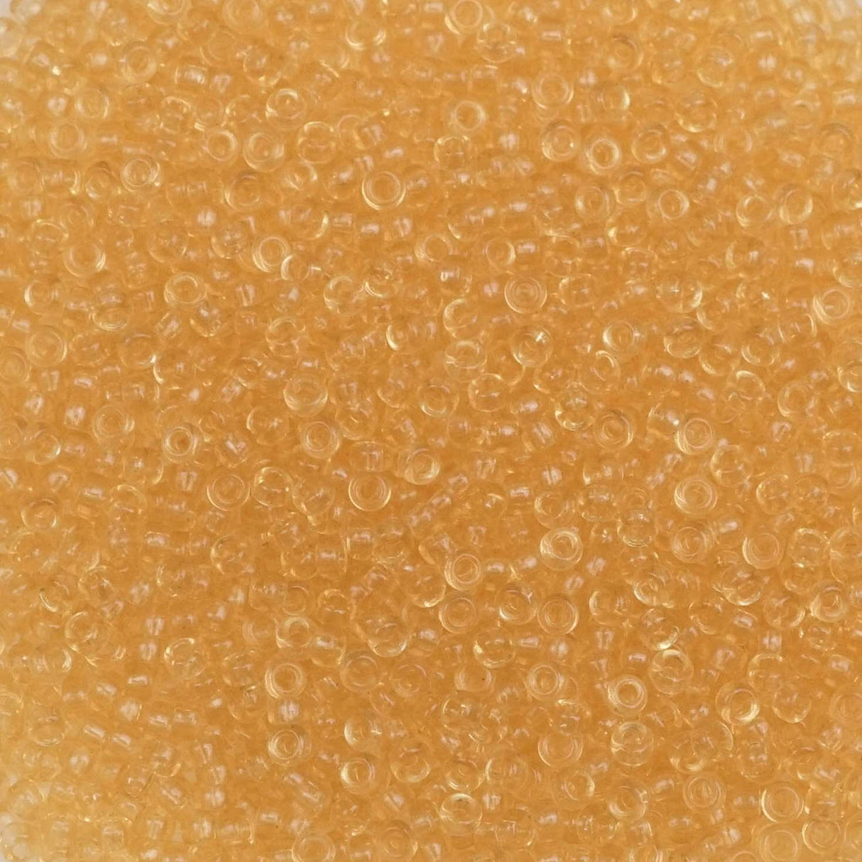 193-15132.SLC.1.jpg 15/0 Seed Beads - Transparent Light Topaz 10g Image