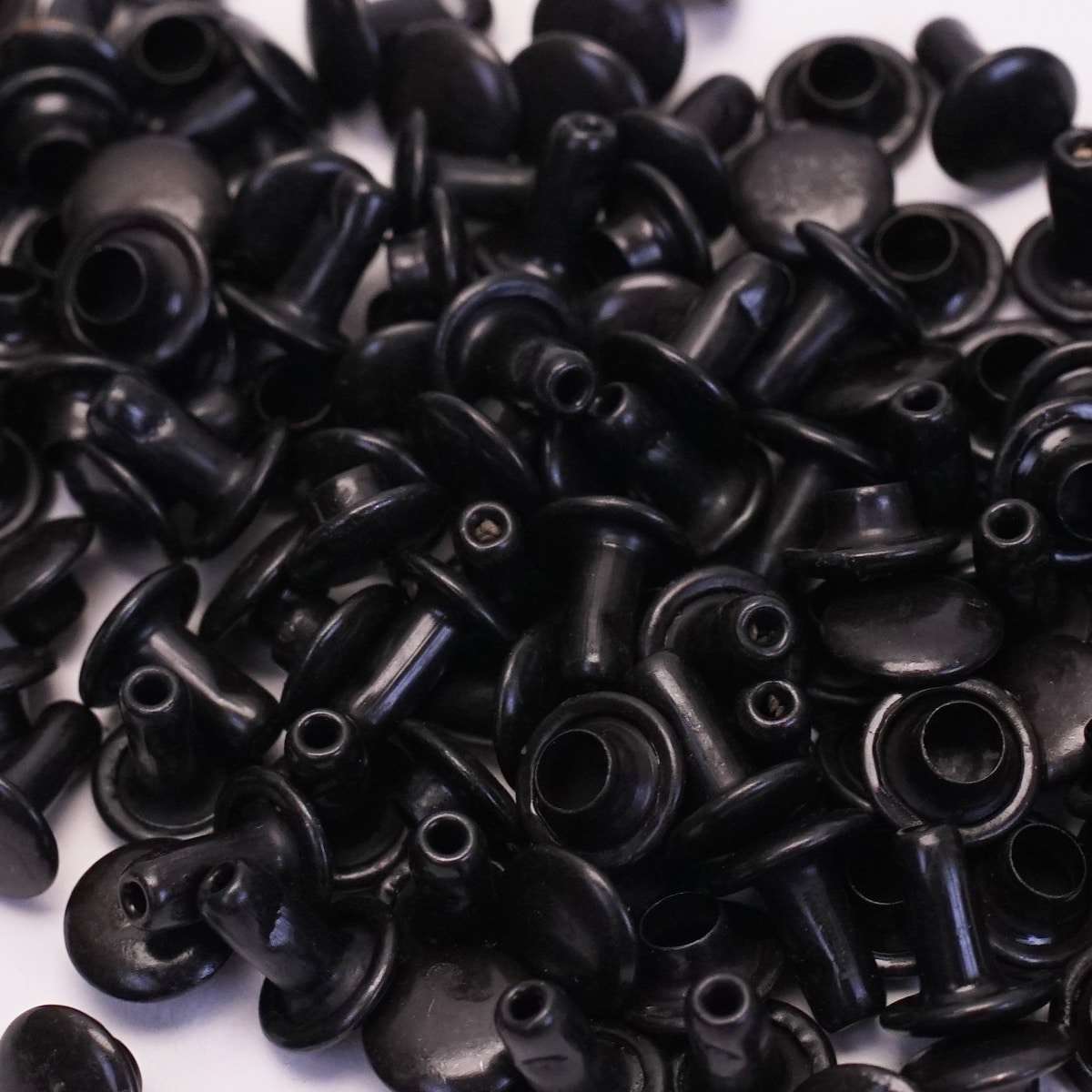 SBDCR.Shiny Black.Small.02.jpg Double Capped Rivet - Solid Brass Image