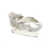HOST.Black and White Speckled.02.jpg Hair On Strips Image