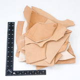 144-70770.SLC.1.jpg Veg Tan Tooling Leather Pieces - 2lbs Image