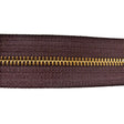 129-135302.SLC.jpg YKK #5 Zipper Tape - Brown/Brass Yard Image