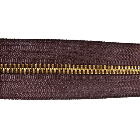 129-135302.SLC.jpg YKK #5 Zipper Tape - Brown/Brass Yard Image
