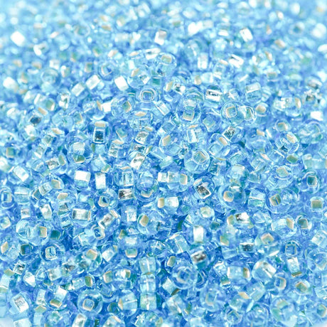 222-1442018.SLC.1.jpg 10/0 Seed Beads - Aqua Lined 110g Image