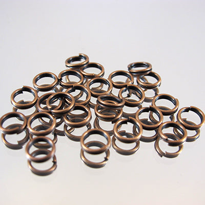 339-137.SLC.jpg 6mm Split Rings - Antique Copper 20pk Image