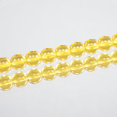 222-4139.SLC.jpg 6mm Amber Round Glass Bead Strand Image
