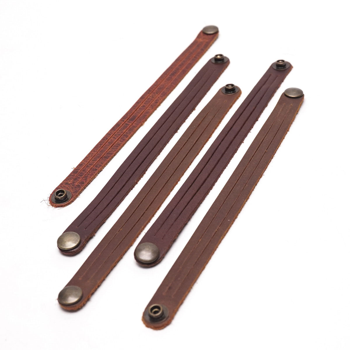 144-47463095.SLC.02.jpg 5pk Oil Tan Mystery Braid Bracelets - Antique Brass Snap Image