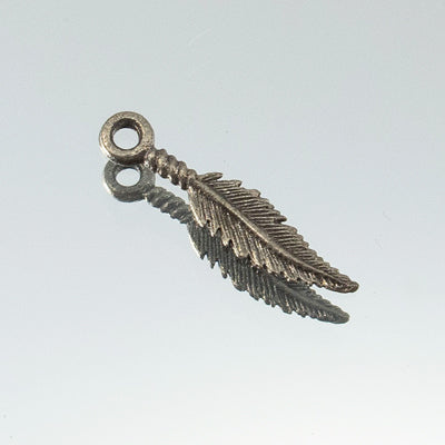 222-7601.SLC.jpg X-Small Feather Charm - Nickel Plate Image