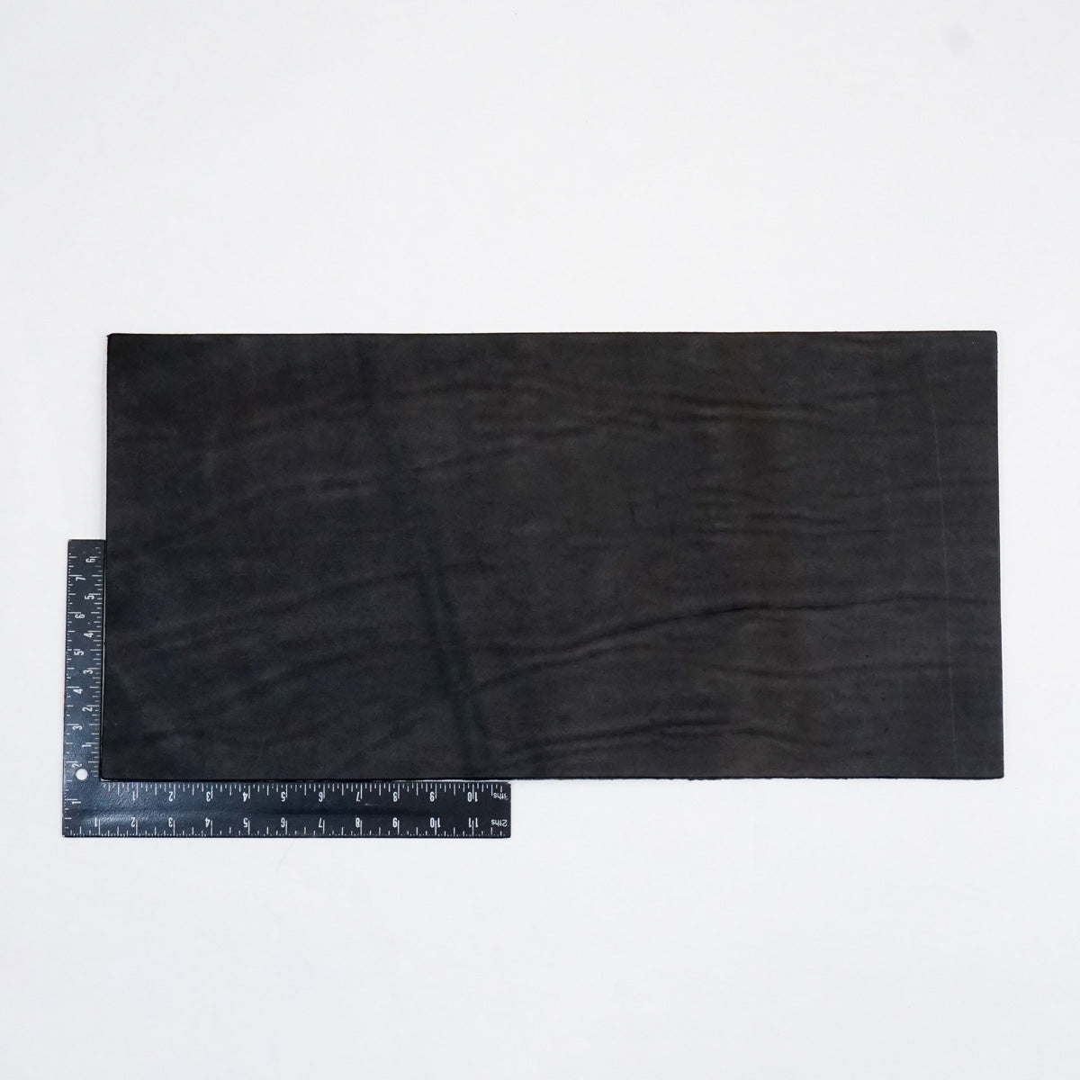 49-9022.SLC.2.jpg Hermann Oak Drum Dyed Black Pre-Cut 6-7 oz. 12" x 24" Image